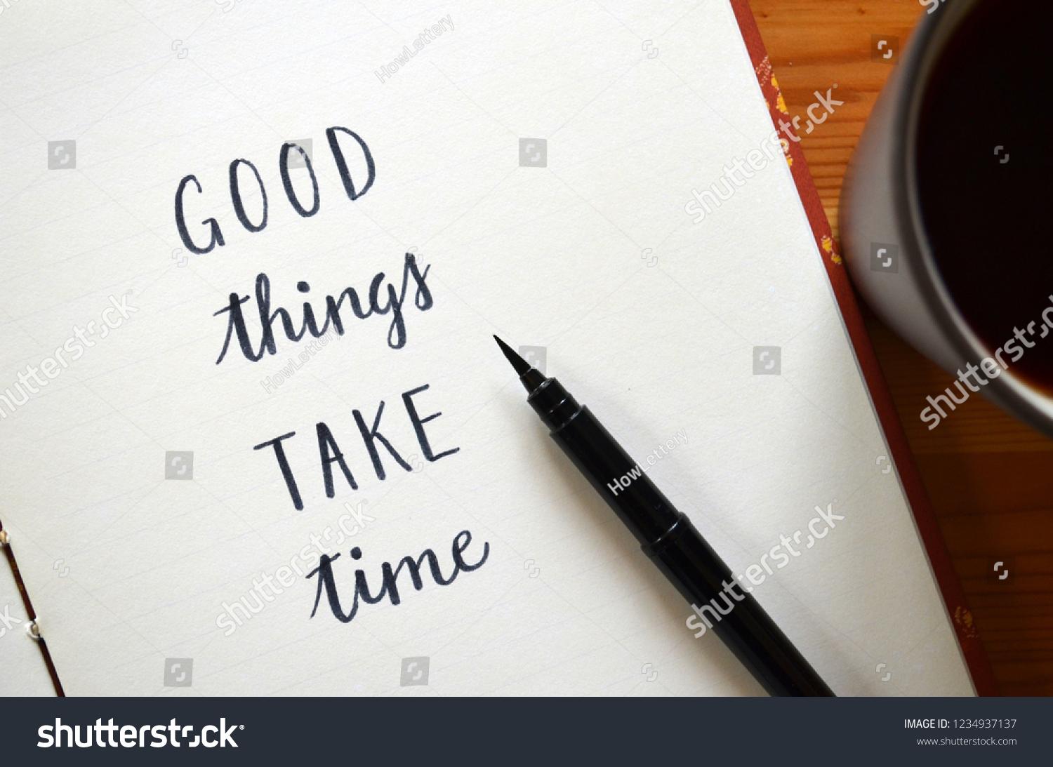 GOOD THINGS TAKE TIME written in notepad on desk with cup of coffee #1234937137