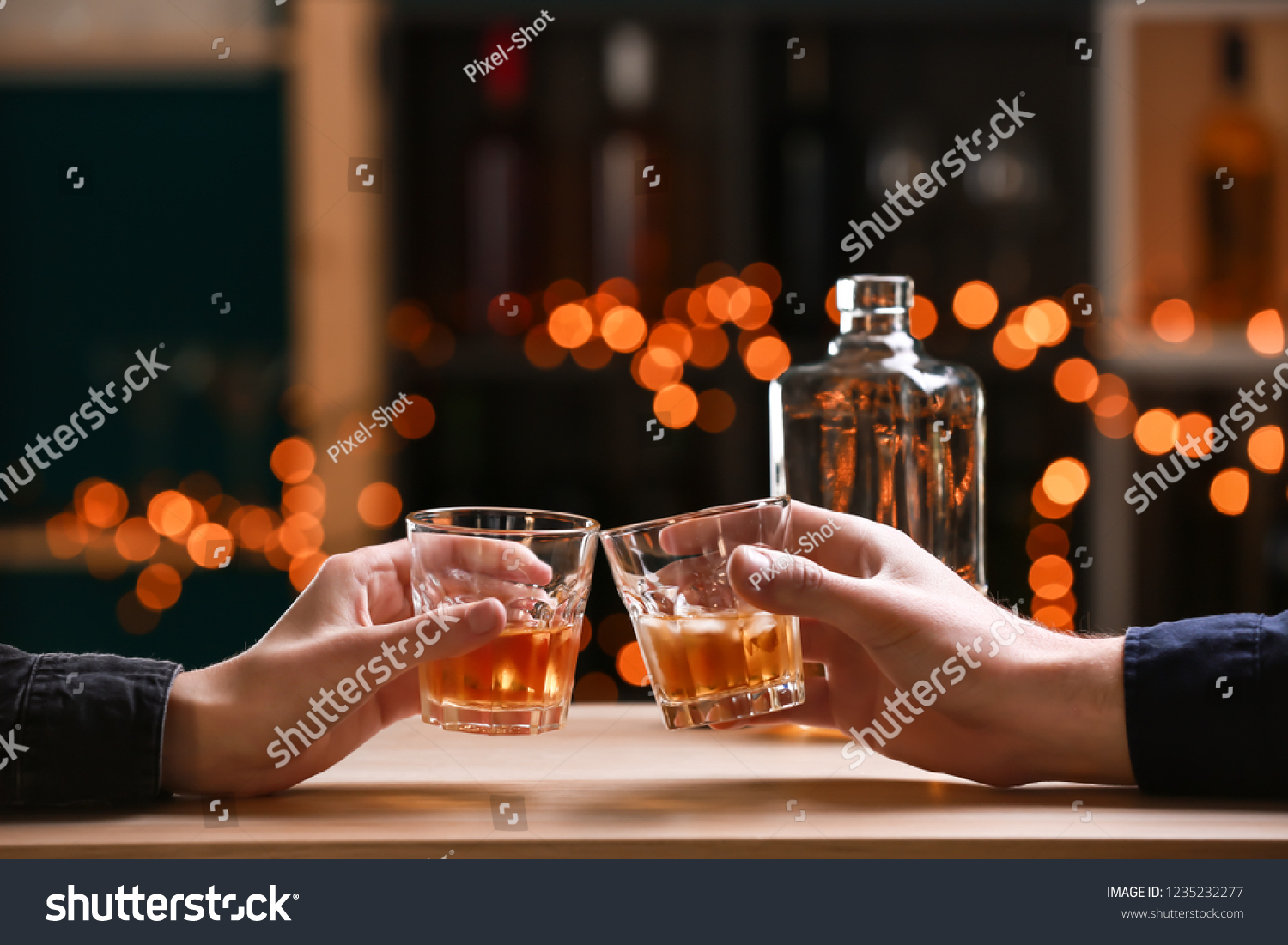 Couple drinking whiskey in bar #1235232277