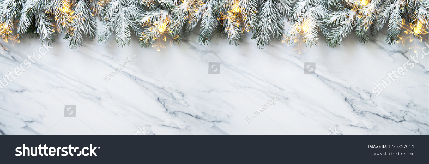 Christmas background with xmas tree on white marble background. Merry christmas greeting card, frame, banner. Winter holiday theme. Happy New Year. Space for text. Flat lay #1235357614