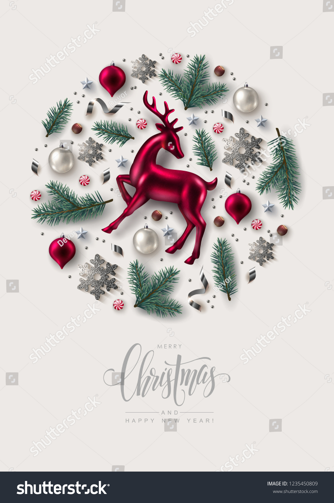 Round Christmas Composition made of Pine Branches, Ornaments, Snowflakes, Confetti and Glass Reindeer.  Flat lay, top view. #1235450809