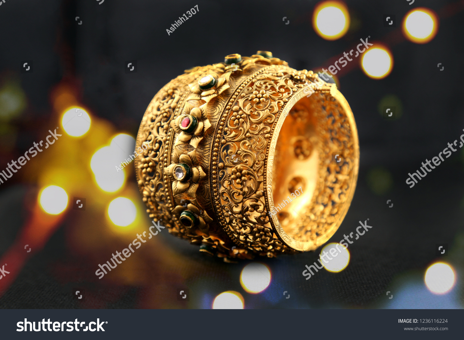 gold bangle - jewellery shoot #1236116224