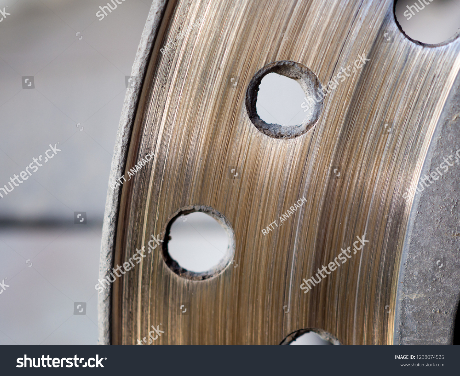 Motorbike engine disk brake. Close up of a motorcycle disk brake. #1238074525
