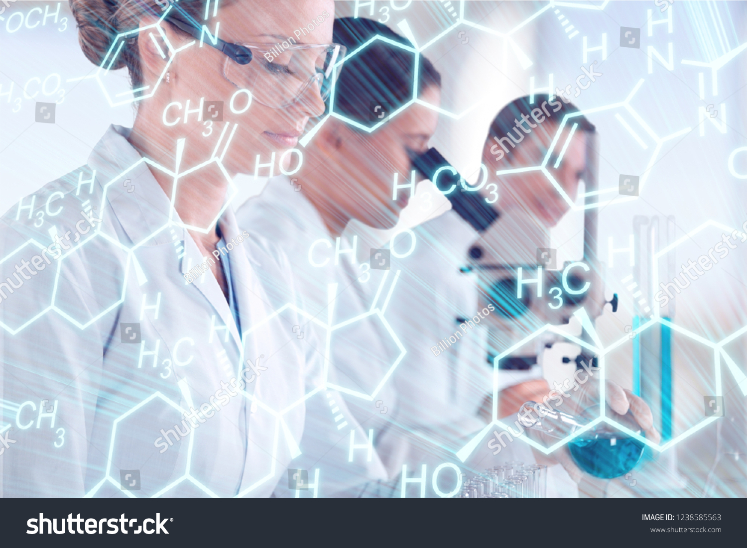 Female and male scientists in glasses working with microscope #1238585563