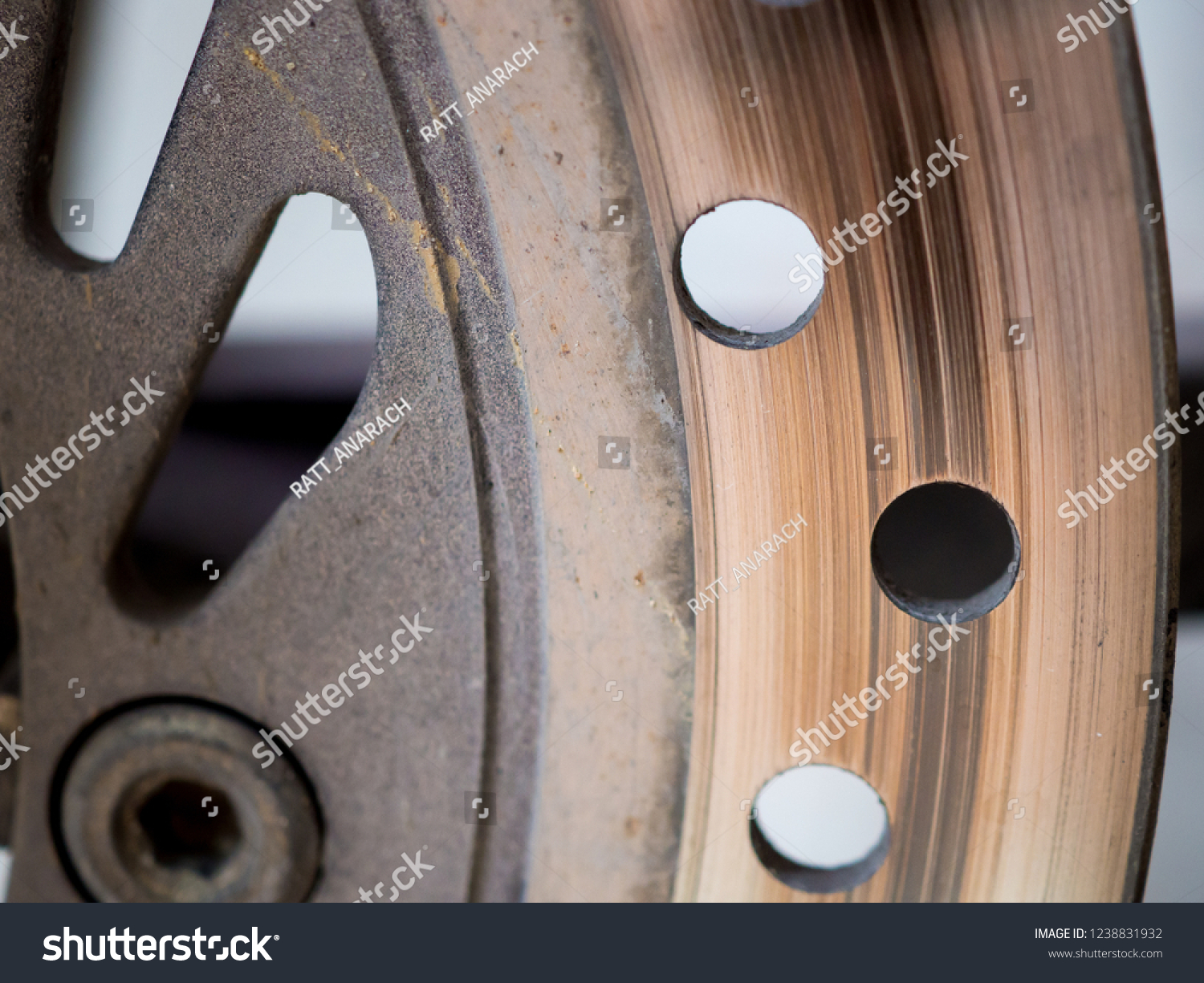 Motorbike engine disk brake. Close up of a motorcycle disk brake. #1238831932