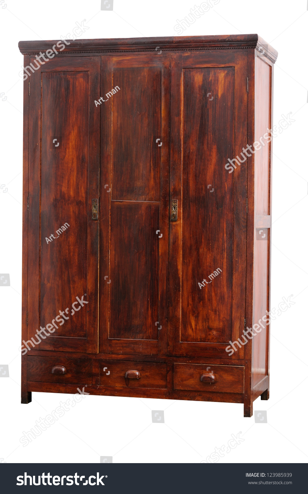 Old hancrafted cupboard isolated over white background. 19th century #123985939