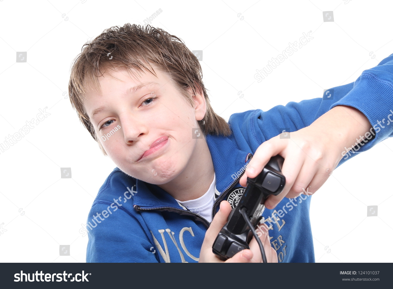 Boy playing with a joystick #124101037