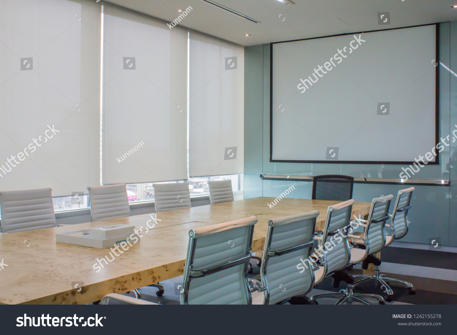 Meeting room with white curtain, shutters, blind, roller. #1242155278