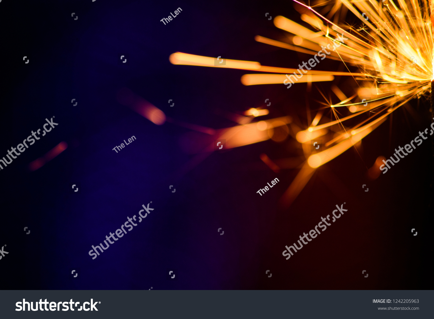 Sparks in the dark. Sparks. Christmas and New Year time. Magic light #1242205963