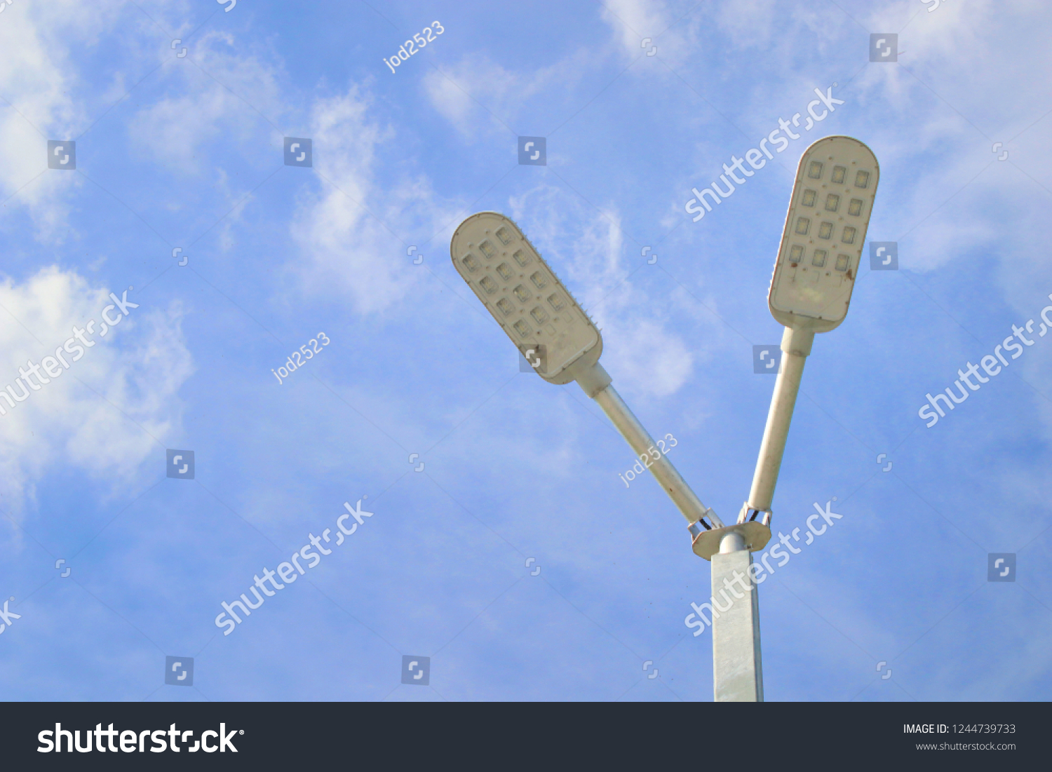 led light pole of car park concept saving energy are saved we save earth #1244739733