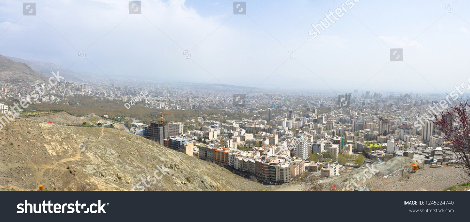 Panorama of the Iranian capital Tehran Elburz Mountains - Tehran Iran #1245224740