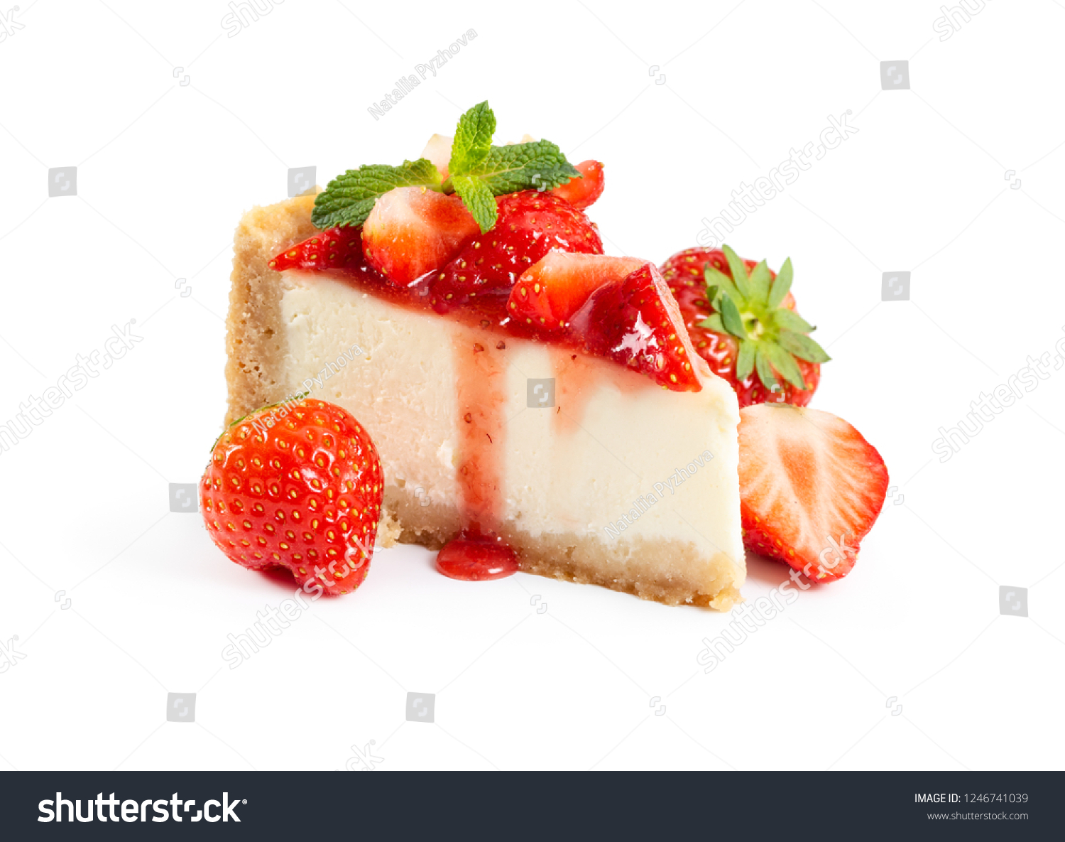 Piece of cheesecake with fresh strawberries and mint isolated on white background #1246741039