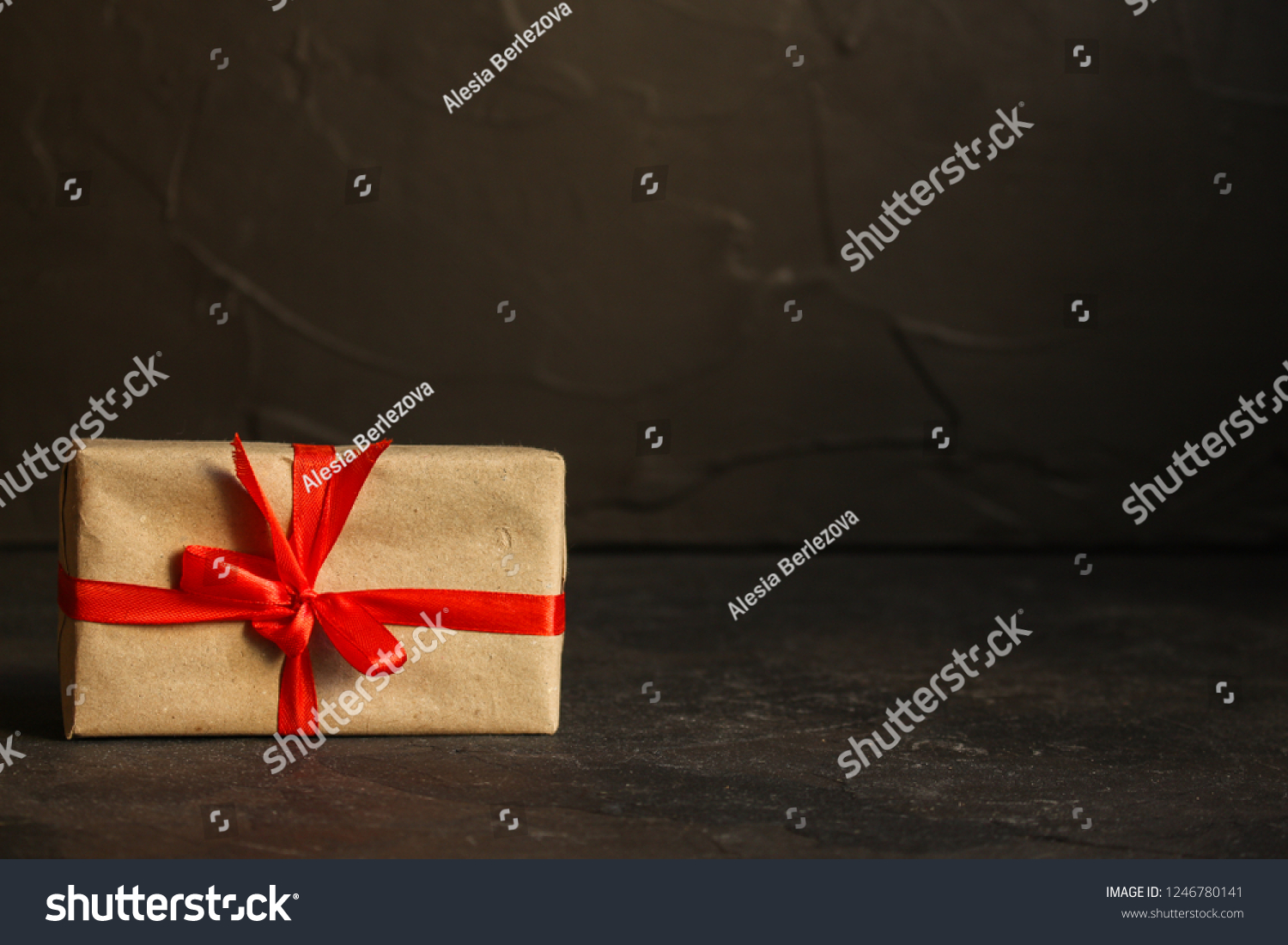 Gift Box with Ribbon - craft paper
 (dark background). top view, copy space #1246780141