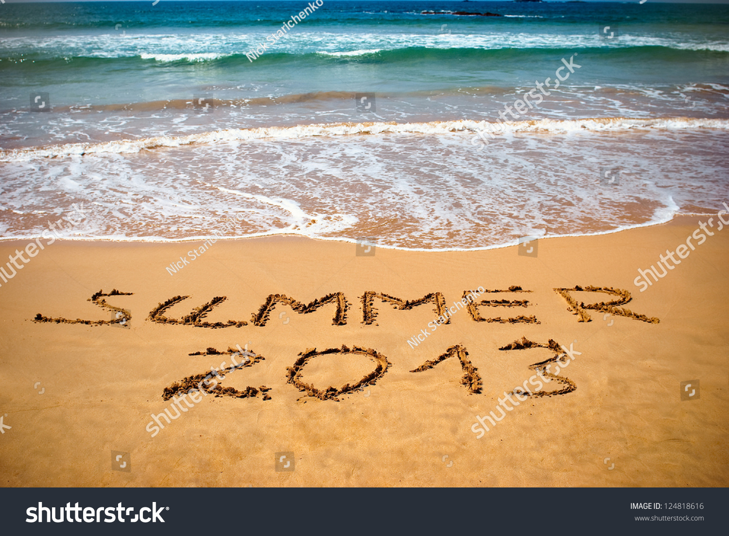 Inscription on wet sand Summer 2013. Concept photo of summer vacation. #124818616