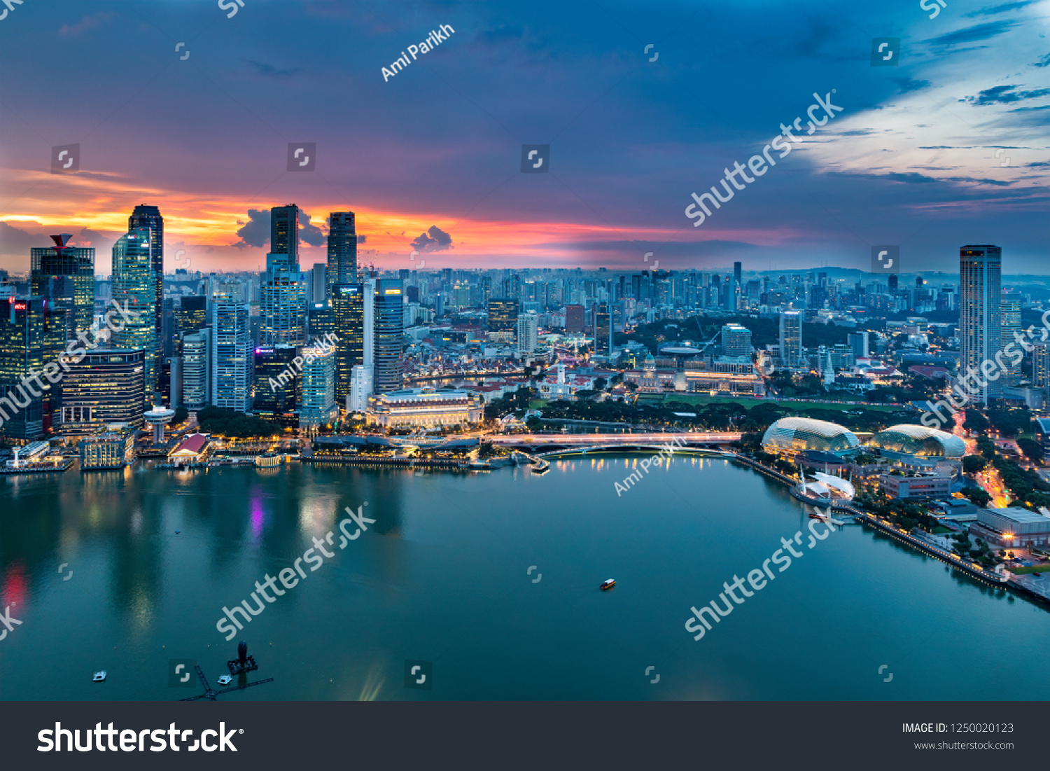 Singapore, Singapore - November 20, 2018:Sunset View of the Singapore Skyline from the Marina Bay Sands Hotel, on November 20, 2018 in Singapore #1250020123