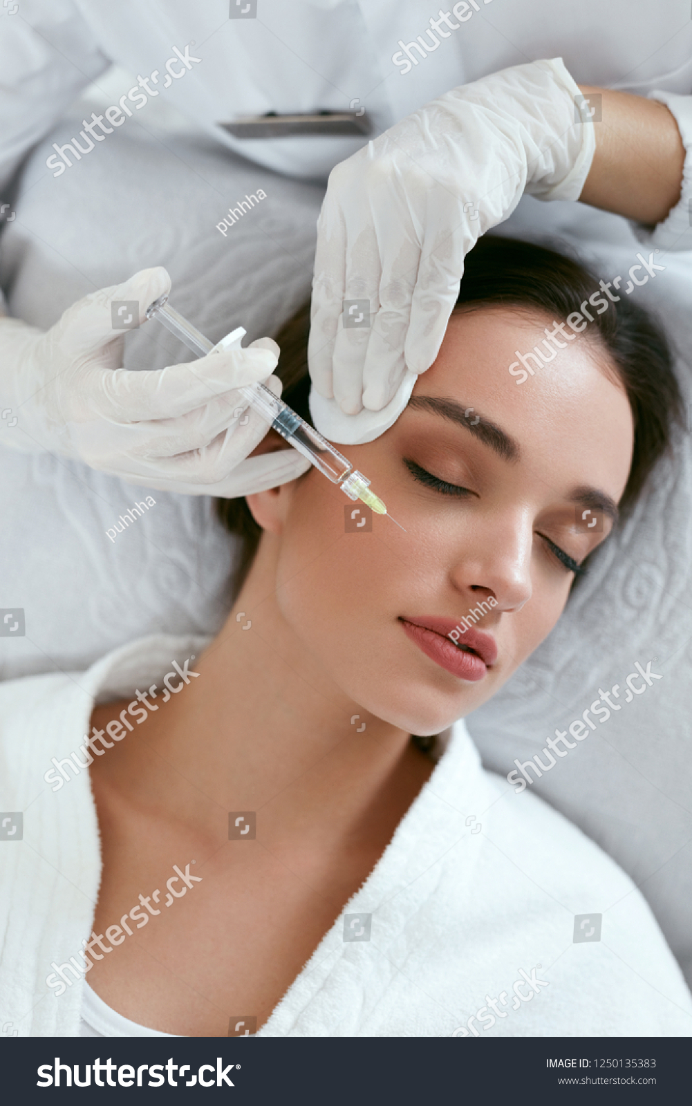 Beauty Injections. Woman Getting Face Lifting Procedure Closeup #1250135383