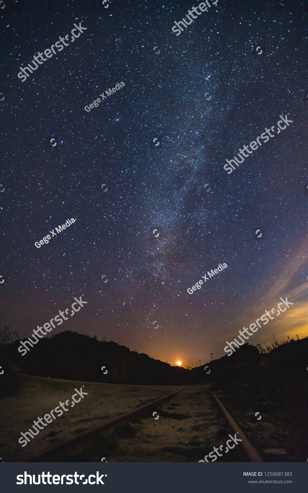Milky Way Astrophotography Star Night Colorful Sky Galaxy long exposure train track mountain view #1250681383