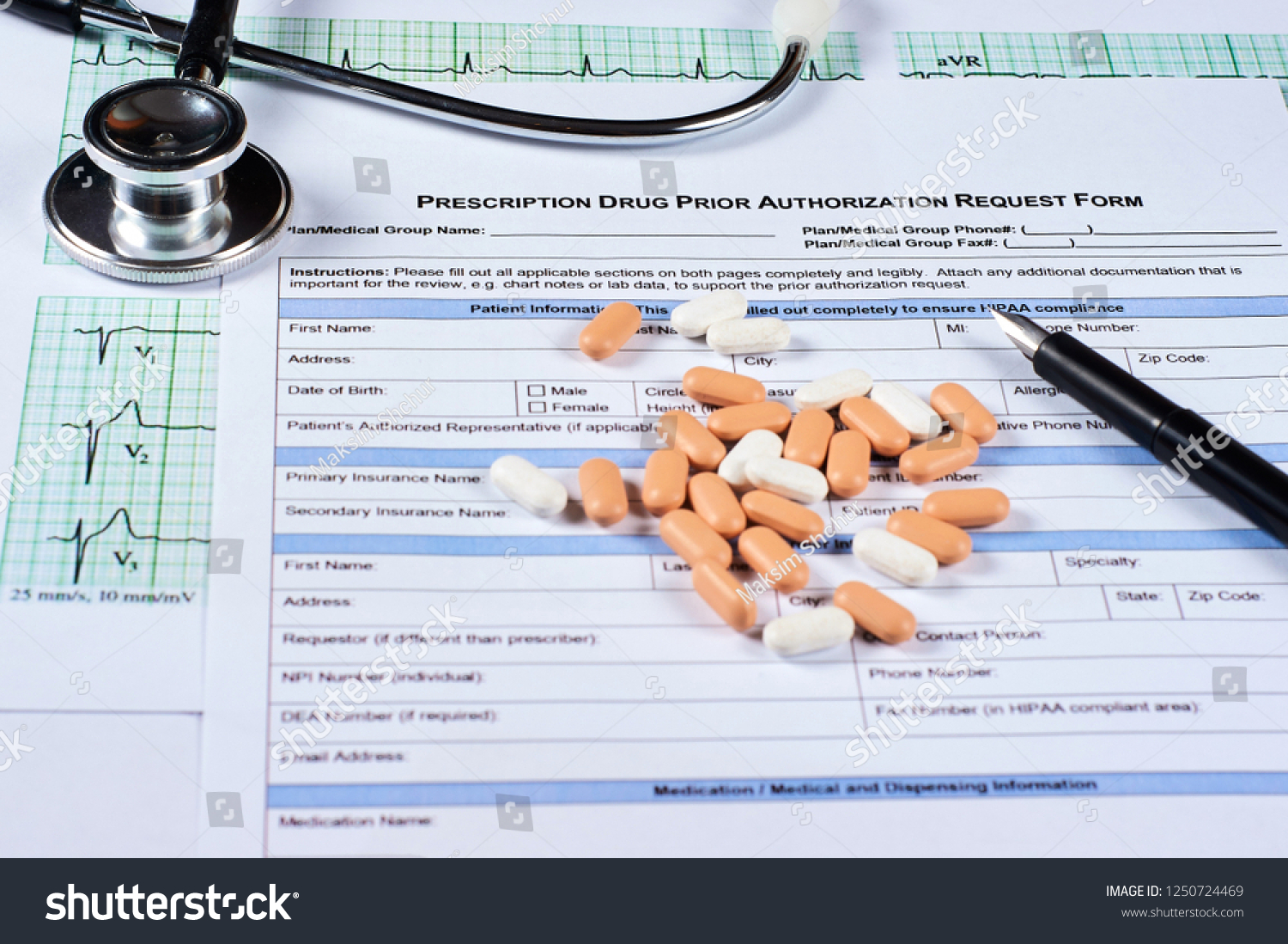 Prescription drugs prior authorization request form, pills, stethoscope and pen on a EKG graph paper background. Close-up. #1250724469
