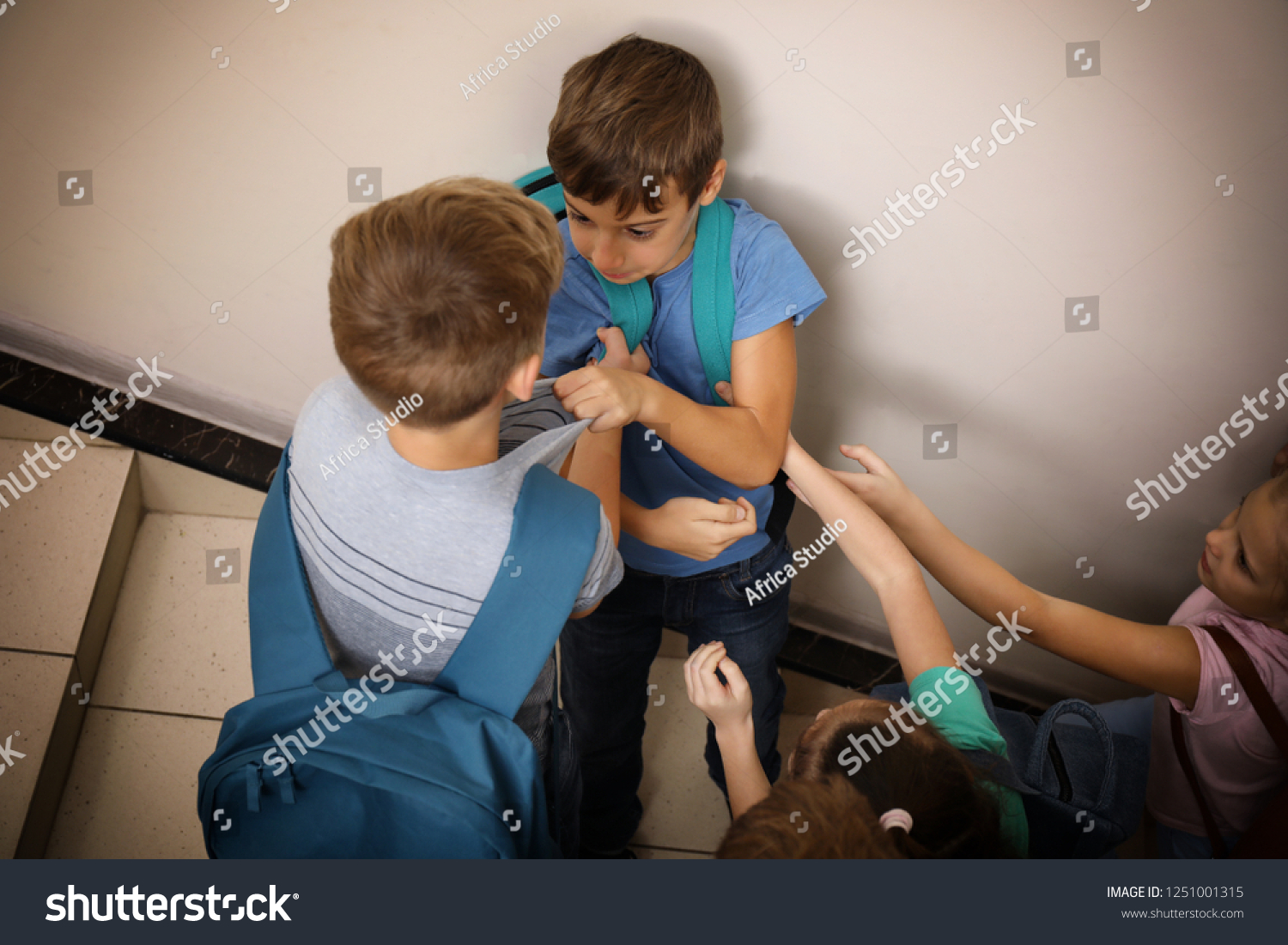 Little children bullying their classmate indoors #1251001315