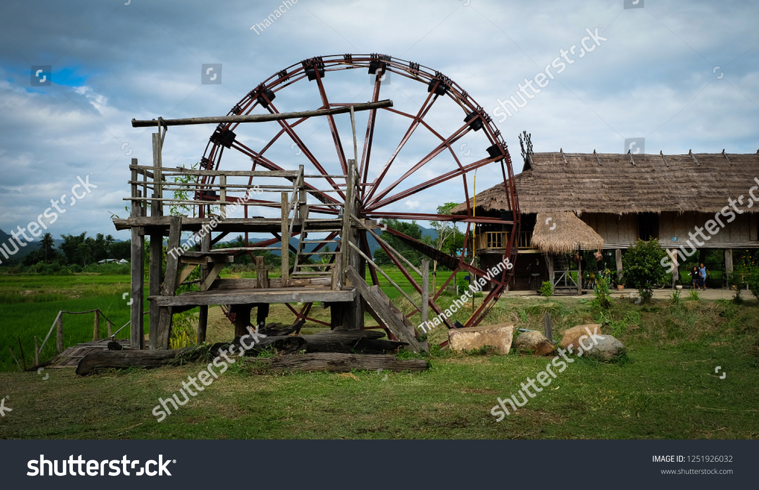 Ancient baler or water turbine in Ban Na Pa Nat, Tai Dam Ethnic Cultural Village, Loei Province, Thailand. #1251926032