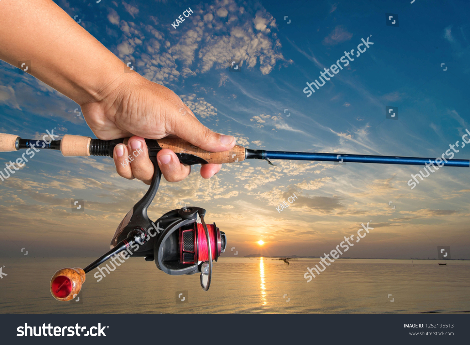 Fishing rods   handle   Hold on the white background. #1252195513