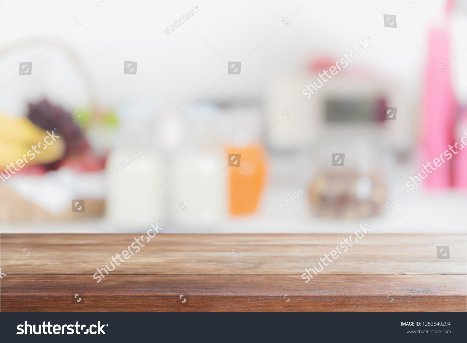 Empty wood table top and blurred kitchen interior background - can used for display or montage your products. #1252840294