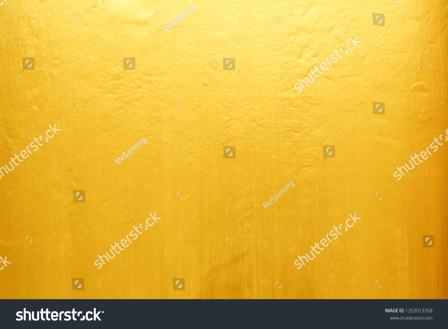 Old Grunge Golden Painting on Wood Wall Background with Light Leak on Top. #1253013358