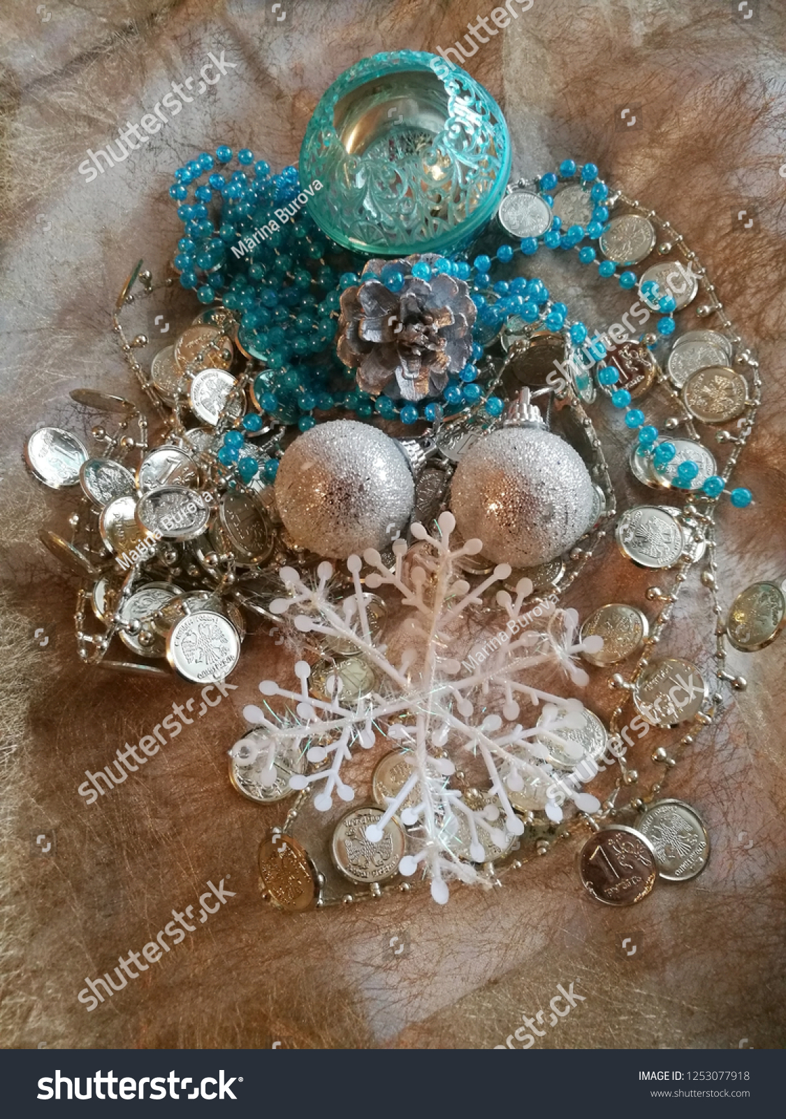 Christmas decorations in a beautiful composition bells silver snowflakes #1253077918