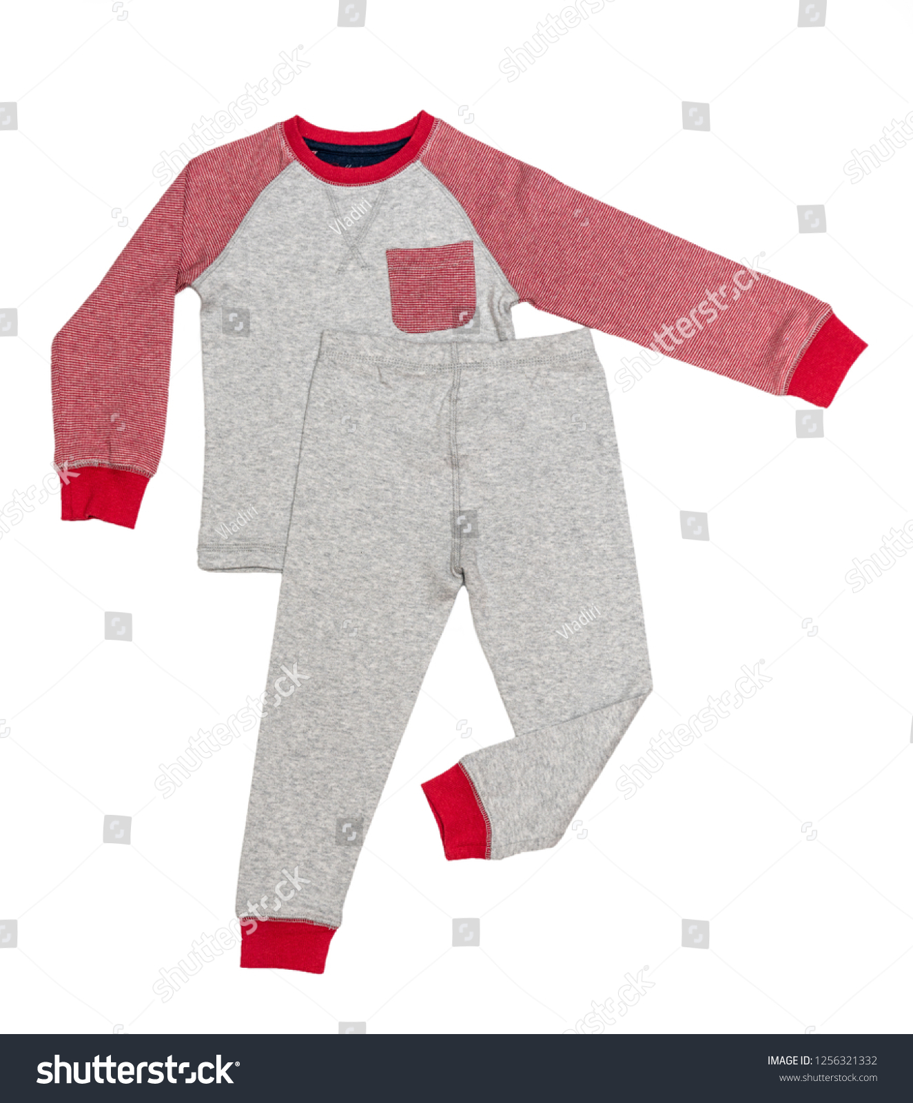 Sleepwear set on white background. Shirt and pants made of gray/red/blue cotton fabric. Pajama for boy. Flat lay. Top view.  #1256321332