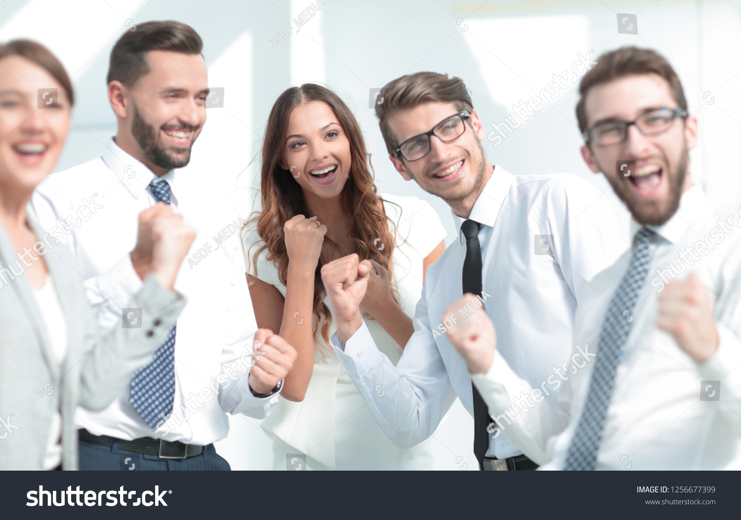 close up.image of a happy business team. #1256677399
