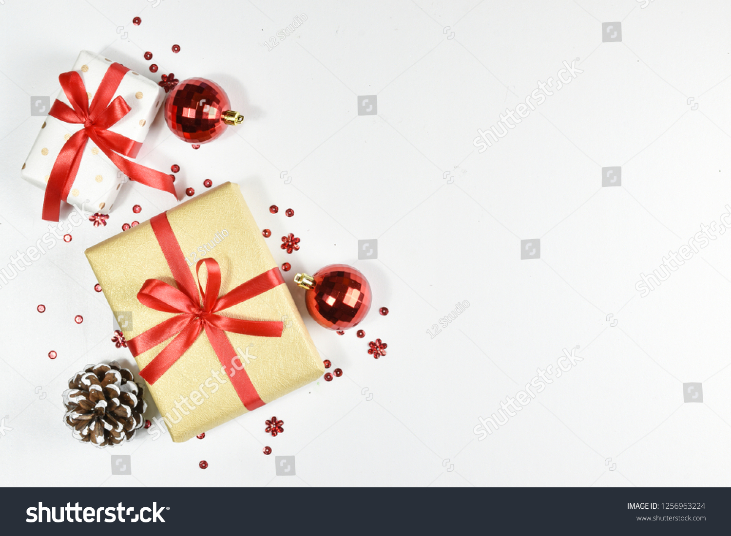 Christmas background. Top view of Christmas decorations. Flat lay of creative design on white background. Copy space for text. #1256963224