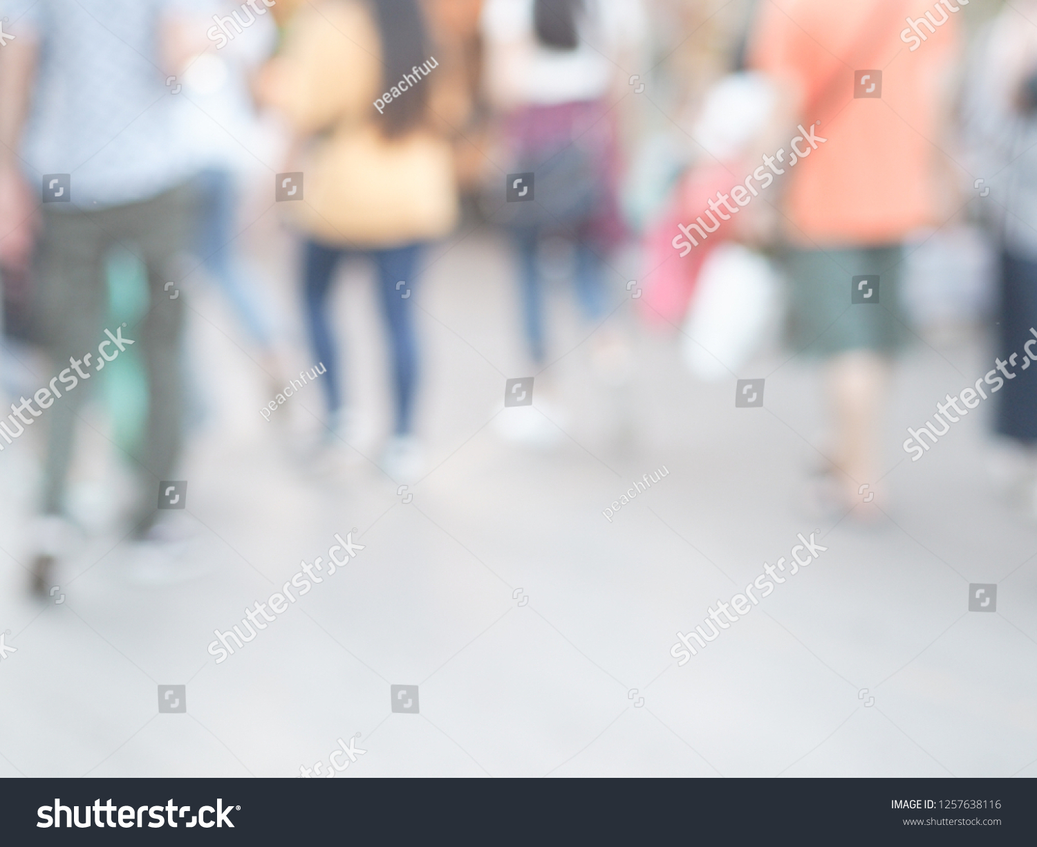 Blurred photo. Close up group of people walking. long and short pants. sneakers. sandal. tourists. rear view. #1257638116