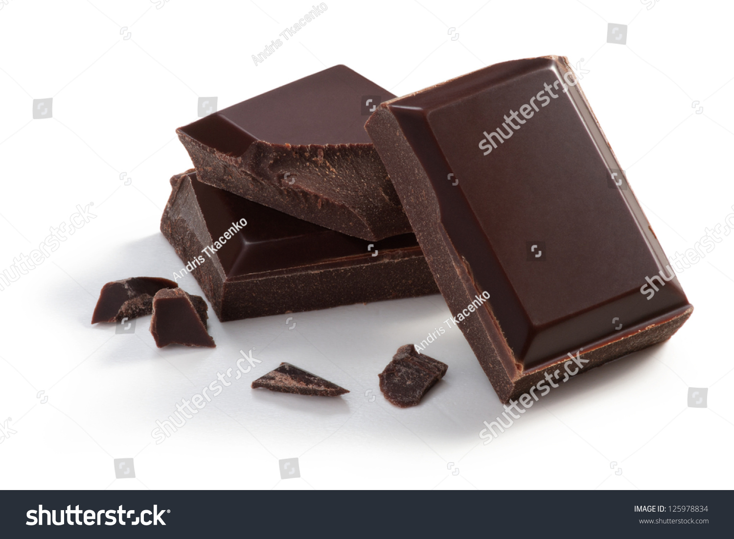 Three  pieces of Chocolate isolated on white, cleaned and retouched photo. #125978834