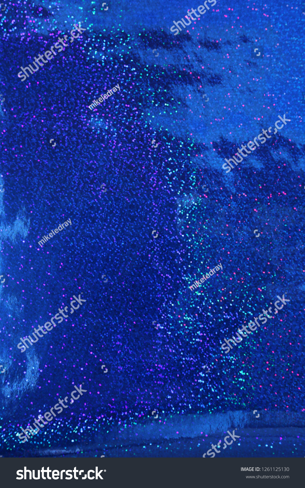 Blue Sparkle Background. Blue, Red, Gold, and Silver Sparkles. Sparkling colors. Wall Papers. Seamless background. Room for text. Room for text overlay. Holiday pattern. color background

 #1261125130