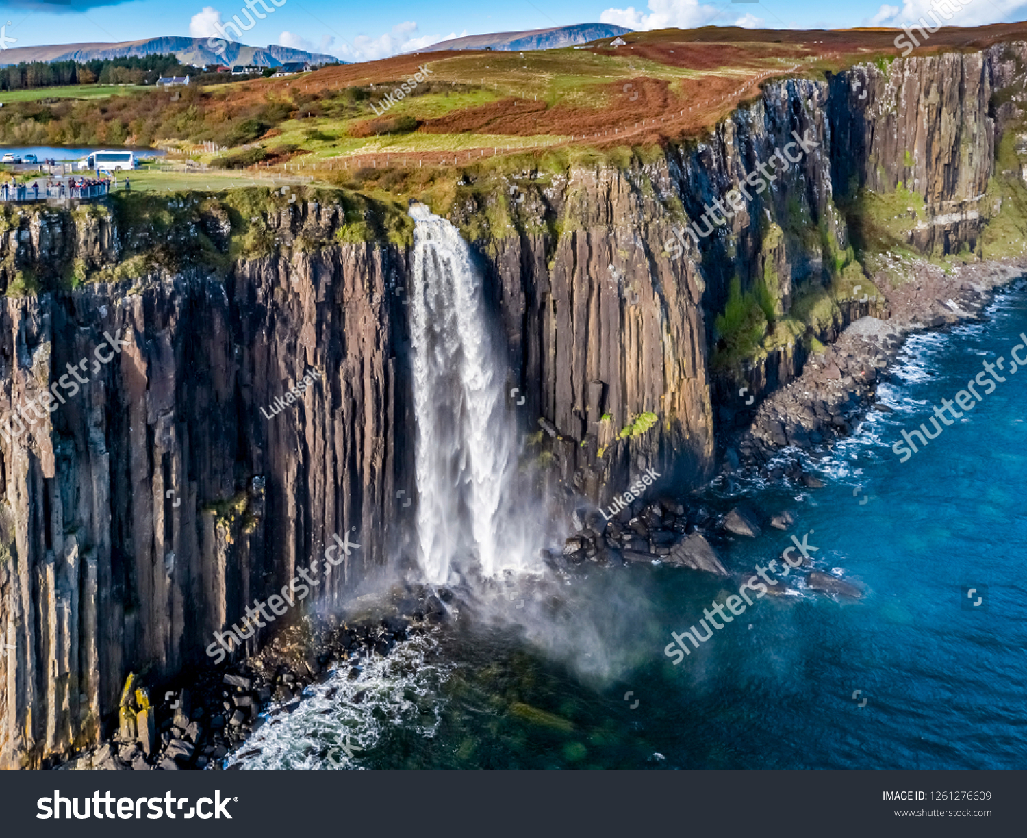 Aerial view of the dramatic coastline at the cliffs by Staffin with the famous Kilt Rock waterfall - Isle of Skye - Scotland. #1261276609