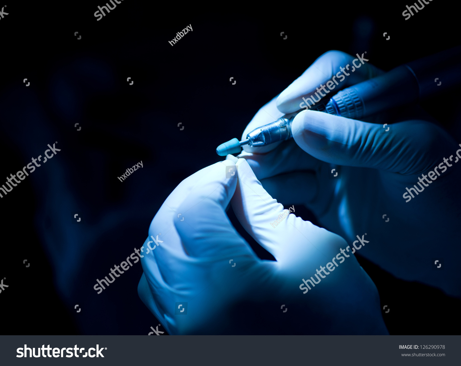 Dental technician working  in a lab #126290978