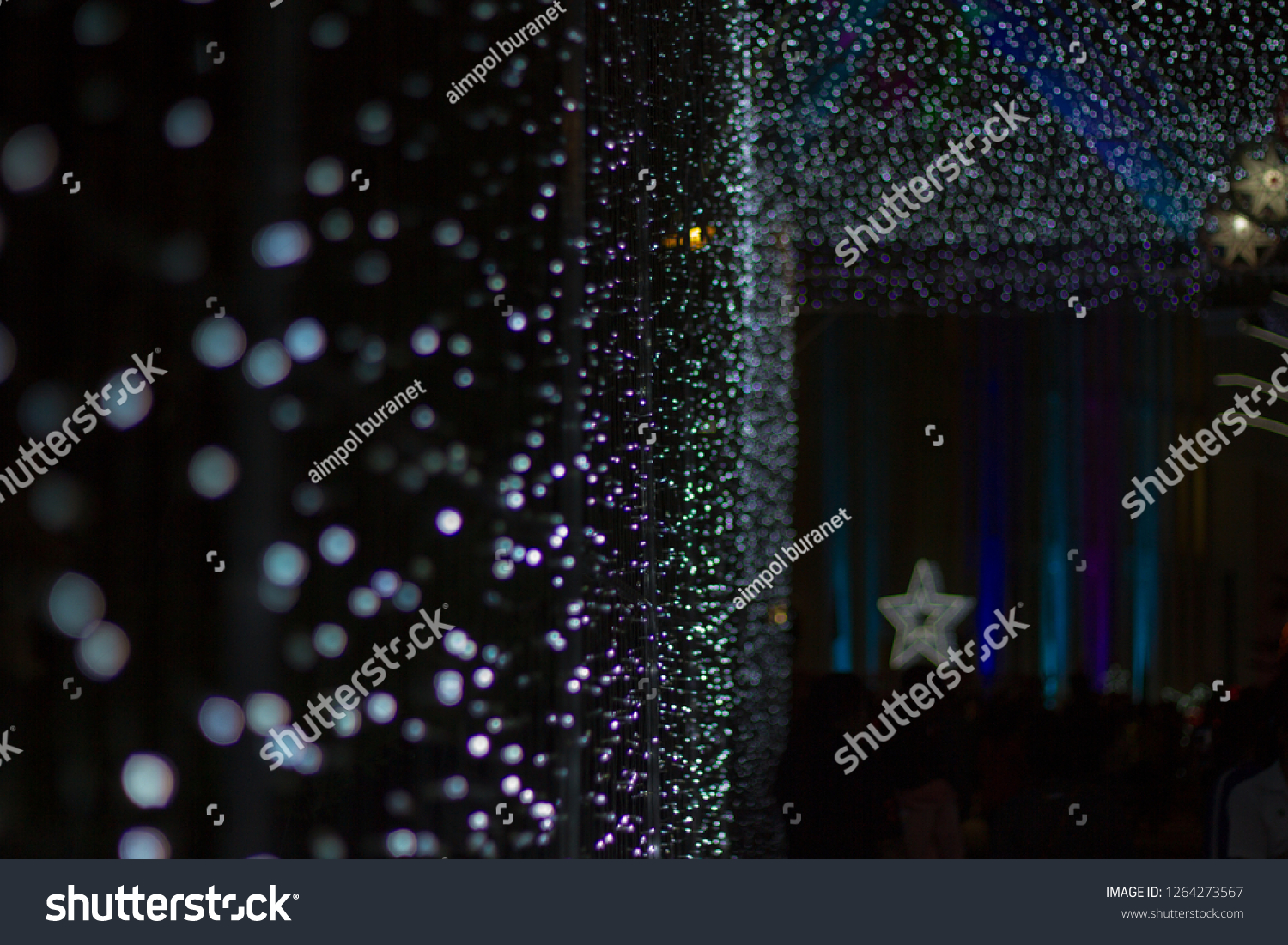 Chrismas Festival ,Light of star,light of Church,lamp of star,light of star,Tunnel of light,Star Wall in the night,Christmas light,at Ban Tha Rae,Sakon Nakhon,Thailand. #1264273567