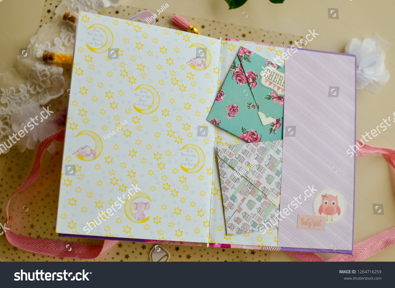 Top view of table with elements for scrapbooking. Kids scrapbooking photo album   #1264716259
