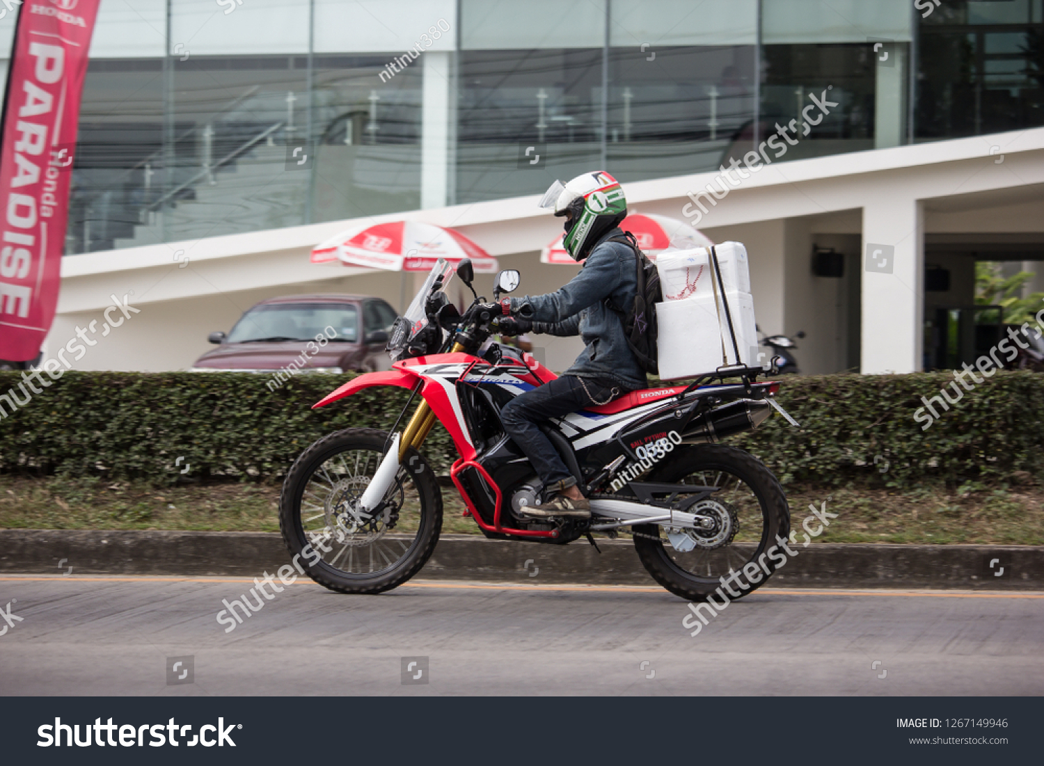 Chiangmai, Thailand - December 18 2018: Private Racing Honda CRF250 Motorcycle. Photo at road no.121 about 8 km from downtown Chiangmai, thailand. #1267149946