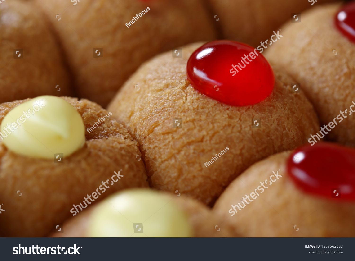 Still life photography of dessert : Doughnuts ball with custard and jam. Selective and selective focus and free space for text. Shooting in studio, Clean food good taste idea concept. #1268563597