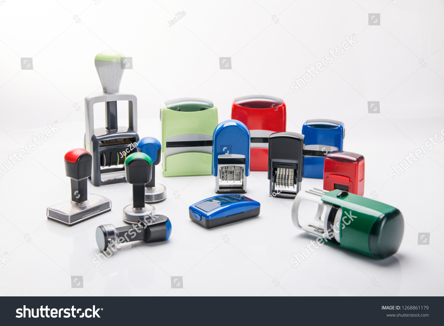 Office rubber stamp. Mechanism of a rubber stamp on a white background.  #1268861179