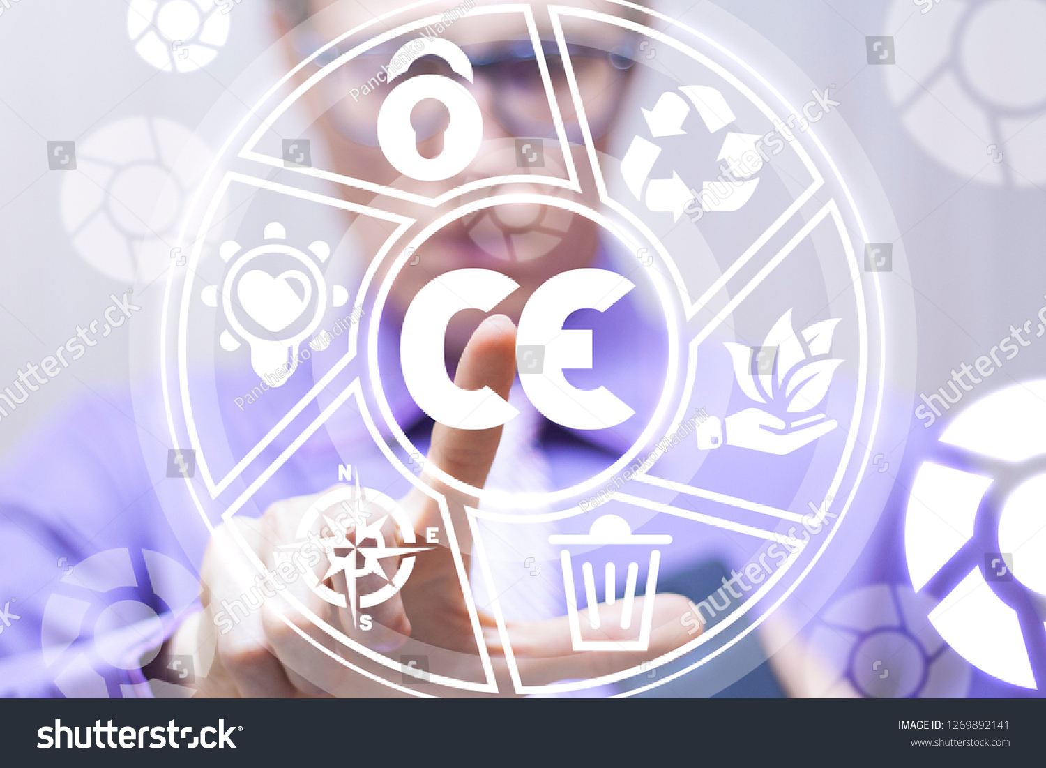 Man pushing a ce abbreviation icon on a virtual screen. CE - european conformity certification mark business industry system. #1269892141