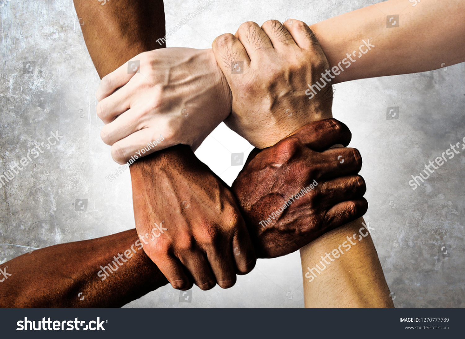multiracial group with black african American Caucasian and Asian hands holding each other wrist in tolerance unity love and anti racism concept isolated on grunge background #1270777789