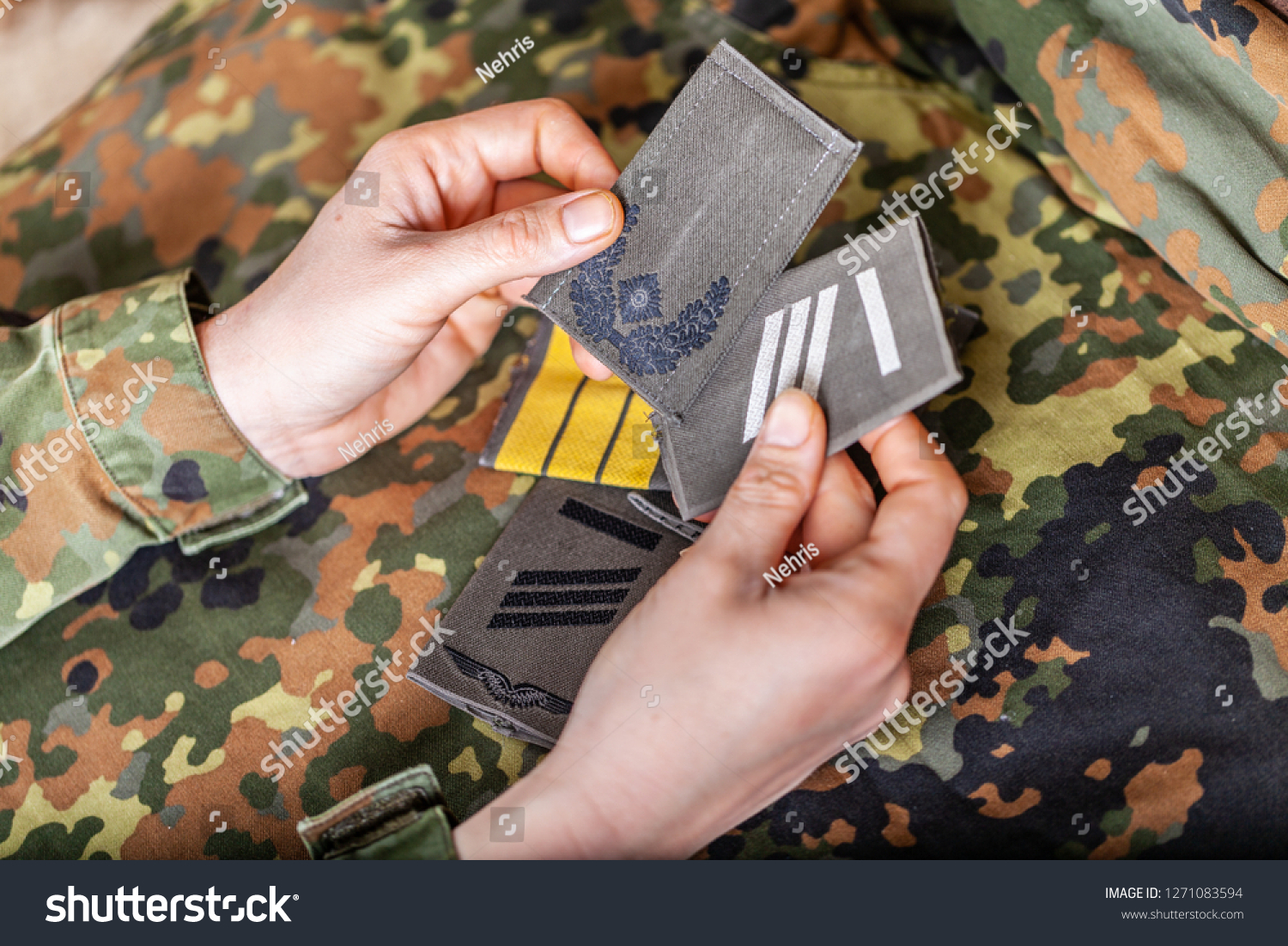 german shoulder ranks on a camouflage background #1271083594