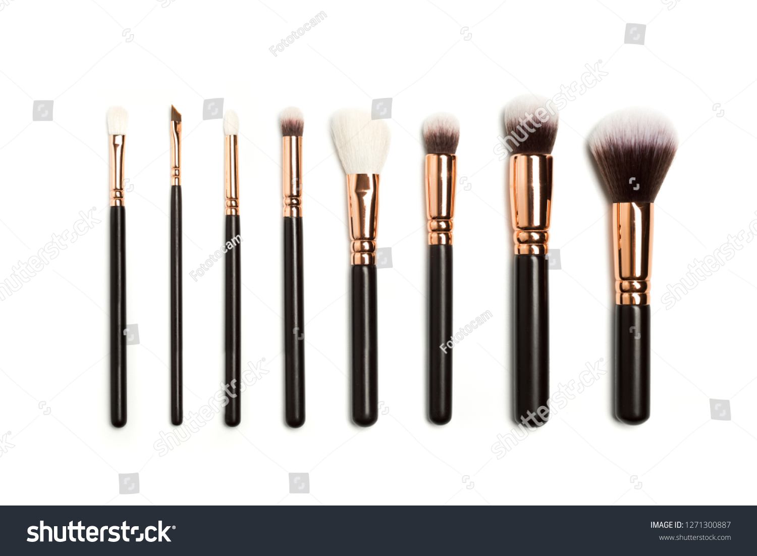 Set of brushes for powder. Powder brush set. Cosmetic brush. Cosmetic product. Powder brush over white background. Cosmetic set. Make up brushes. Make up set. Isolated brushes on white background #1271300887