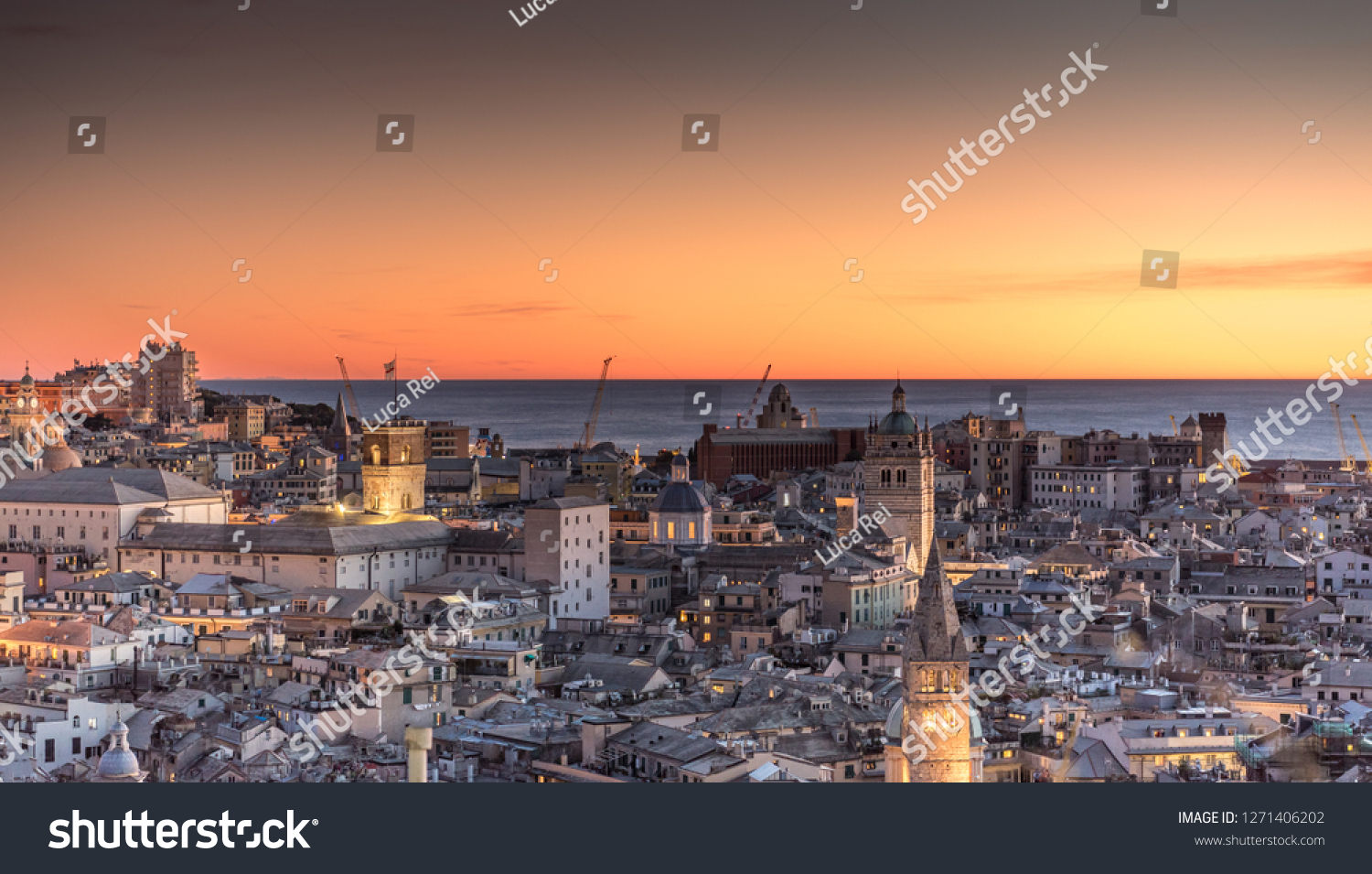 Genova, Italy: Beautiful sunset aerial panoramic view of Genoa historic centre old town (San Lorenzo Cathedral, duomo, Palazzo Ducale), sea and port at dusk. Romantic cityscape Europe at night #1271406202