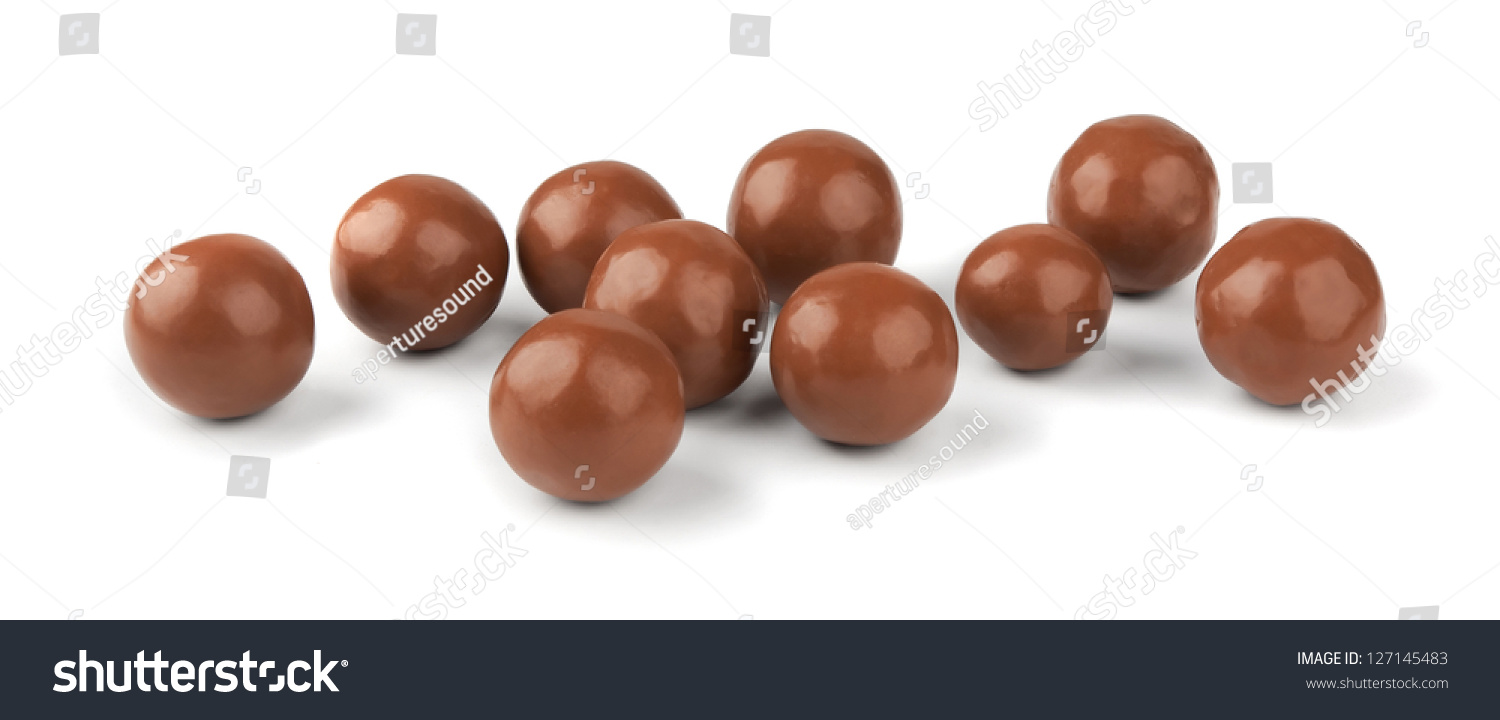 Chocolate balls on a white background #127145483