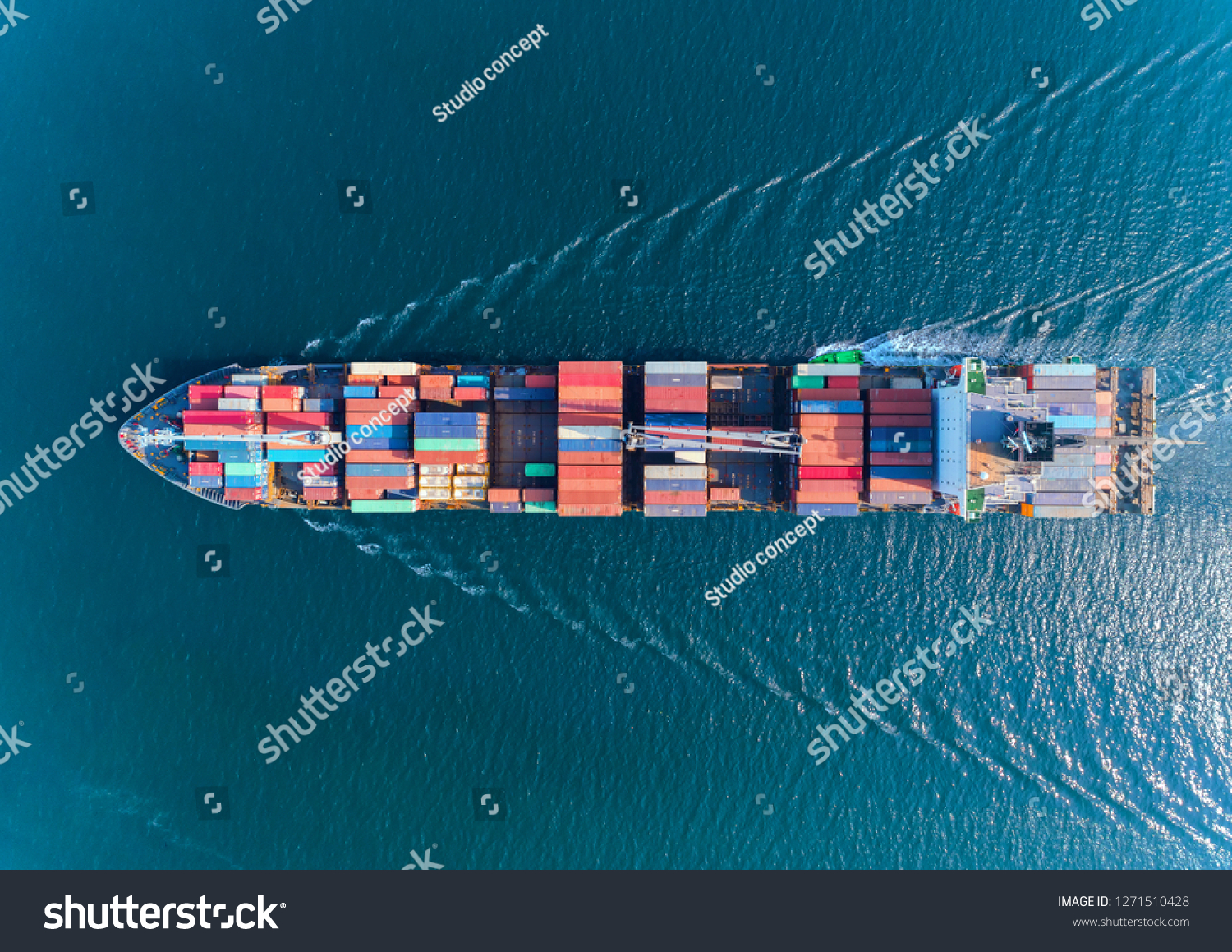 Aerial top view container ship with crane bridge for load container, logistics import export, shipping or transportation concept background. #1271510428
