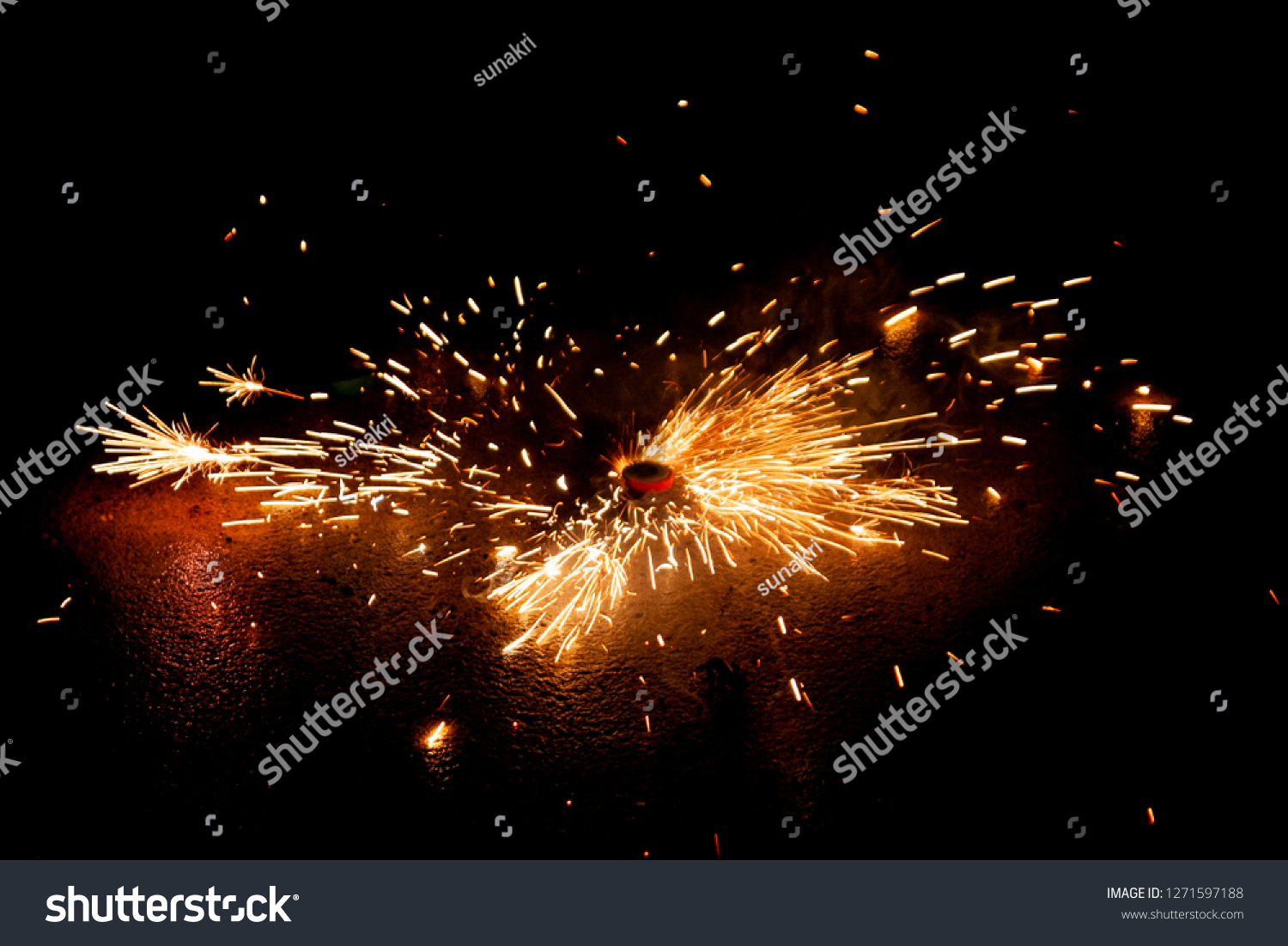 Explosive fireworks on sylvester lightens in the dark with sparks of light #1271597188