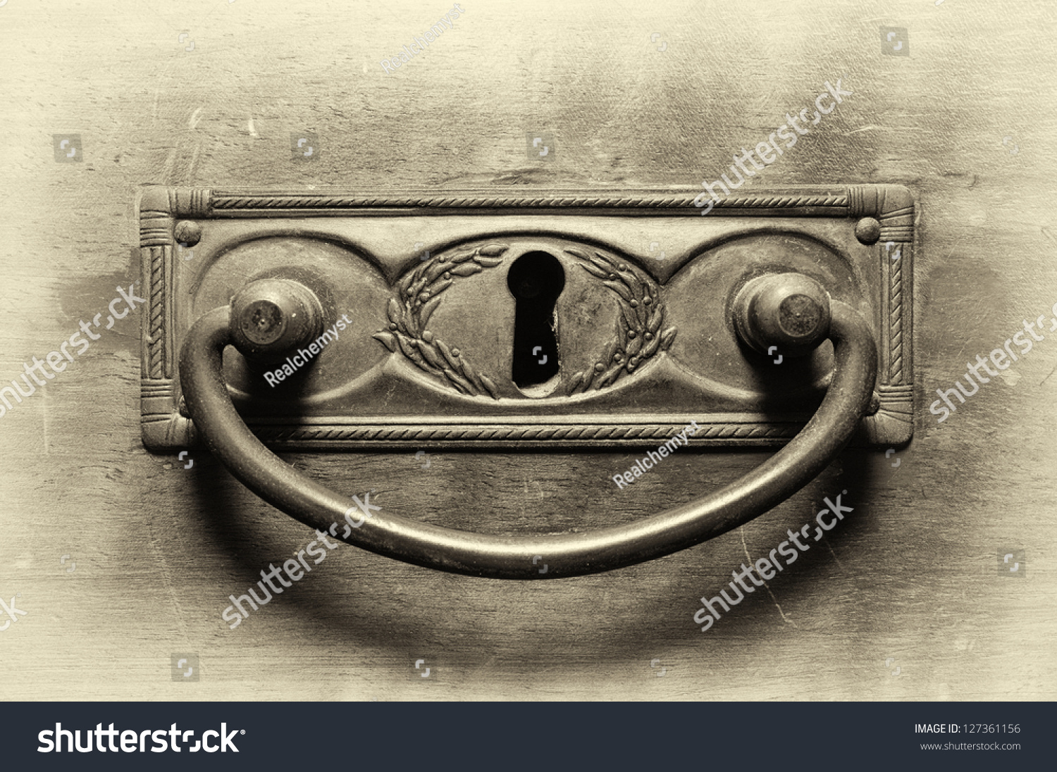 Old drawer handle in sepia tone #127361156