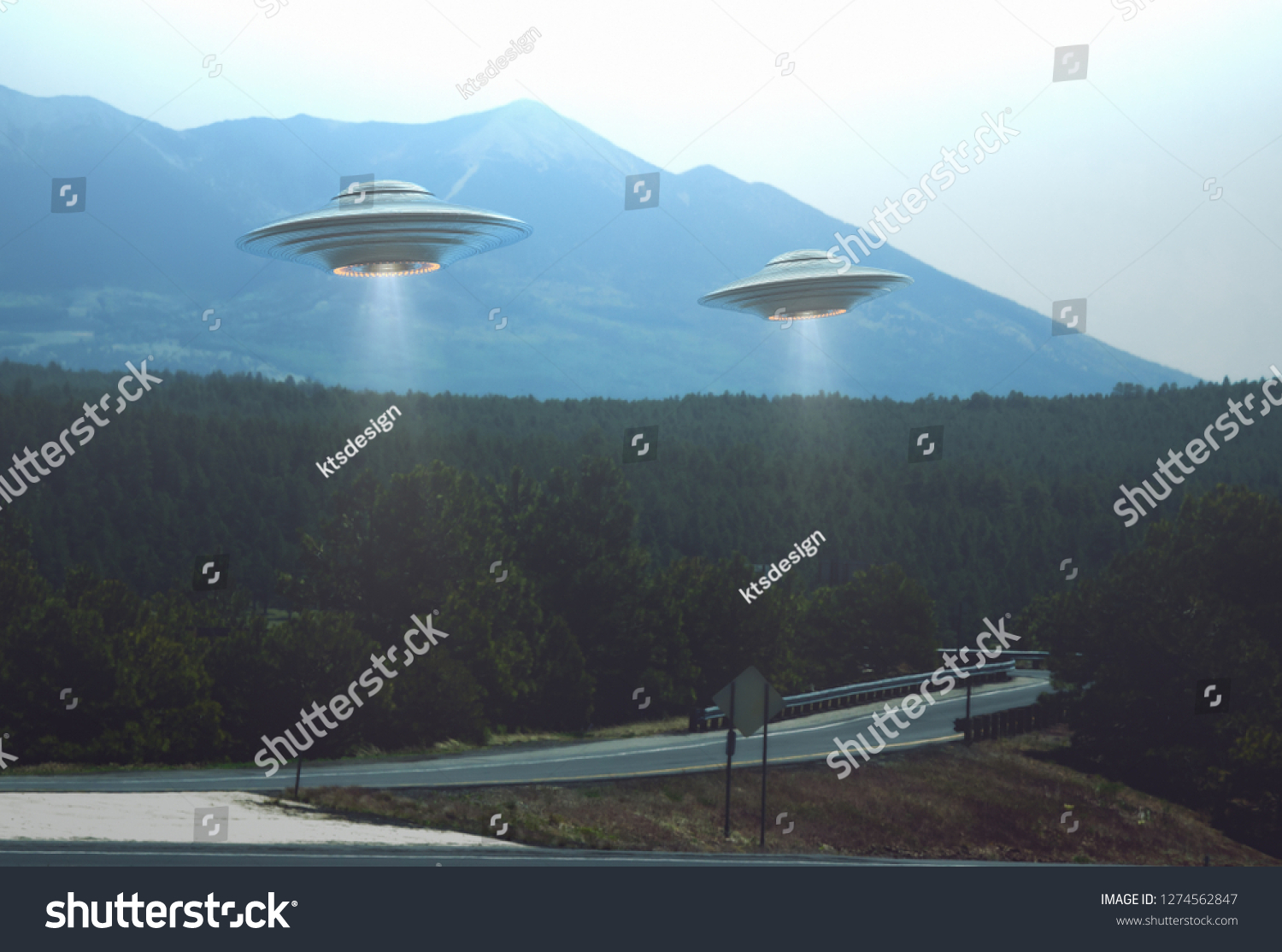 Unidentified flying object. Two UFOs flying over a road among the trees. 3D illustration. #1274562847